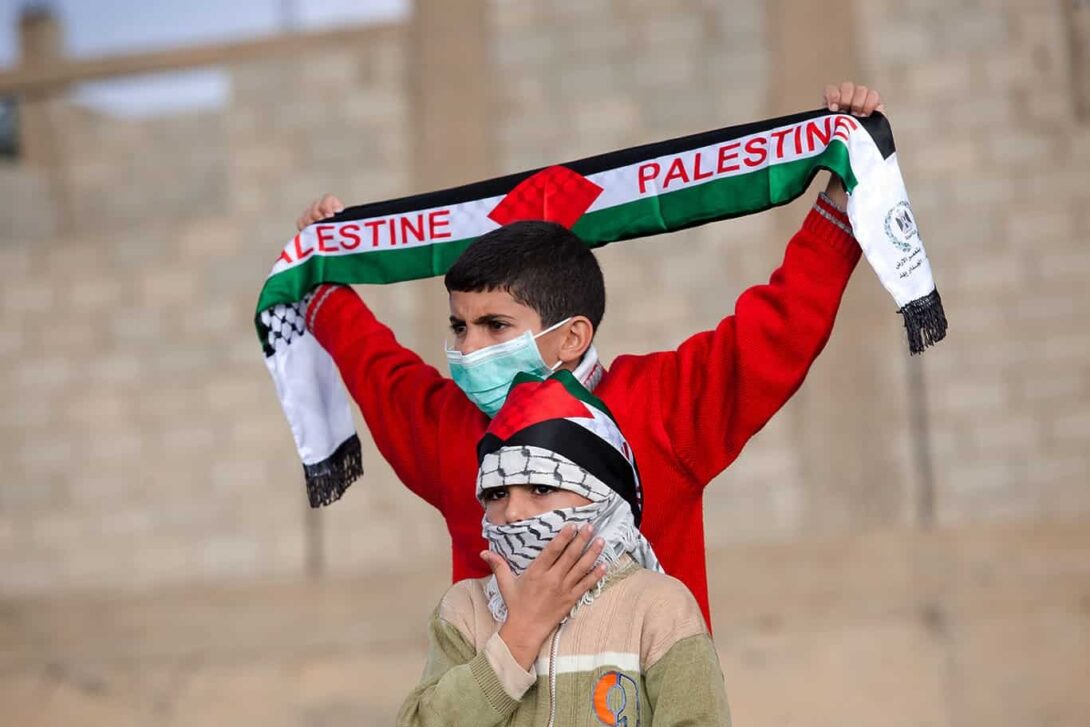 Palestinians in facemasks Edited