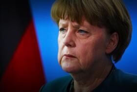 Angela Merkel Pensive Edited e1542023464914